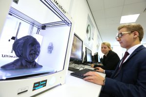 MP071016AH1 Nottingham Post please use code NOAH20161007C1. Lillian Greenwood MP, visit to NUAST ahead of the Nottingham in Parliament Day. Pictured LtR; Katy Walker 16 and Matt Taylor 16 pictured working on a 3D printer image of Einstein. Picture by Andrew Hallsworth, Marlow Photographic.