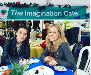 Actor Vicky McClure sat at a table with Victoria Tischler of the University of West London