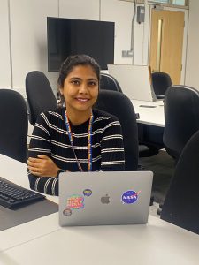 Photo of Chandhini at her desk in the Vesiculab offices