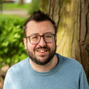 Portrait photograph of PhD researcher Daniel Beever.