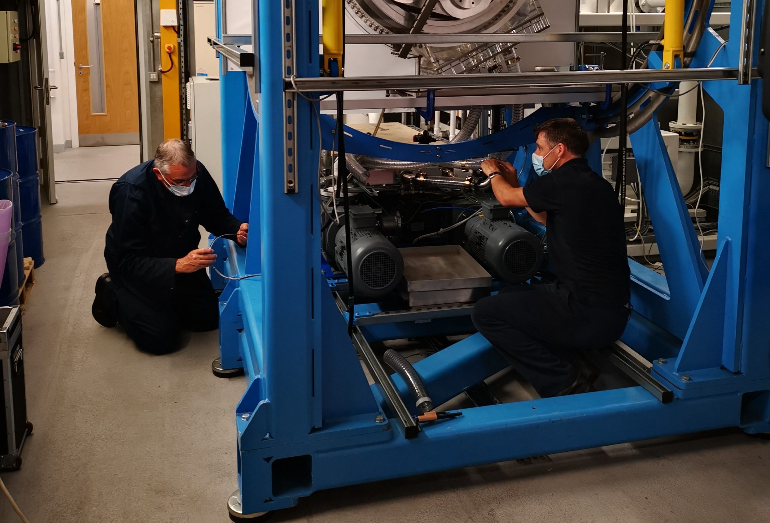 G2GRC technicians at work on machinery