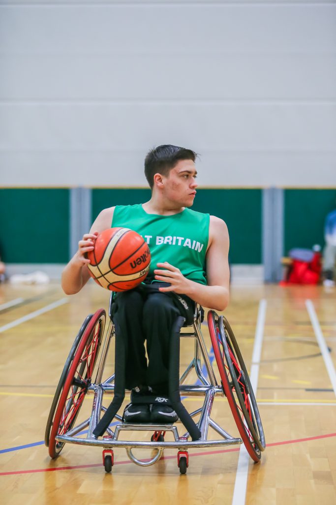 Daniel May playing Wheelchair Basketball