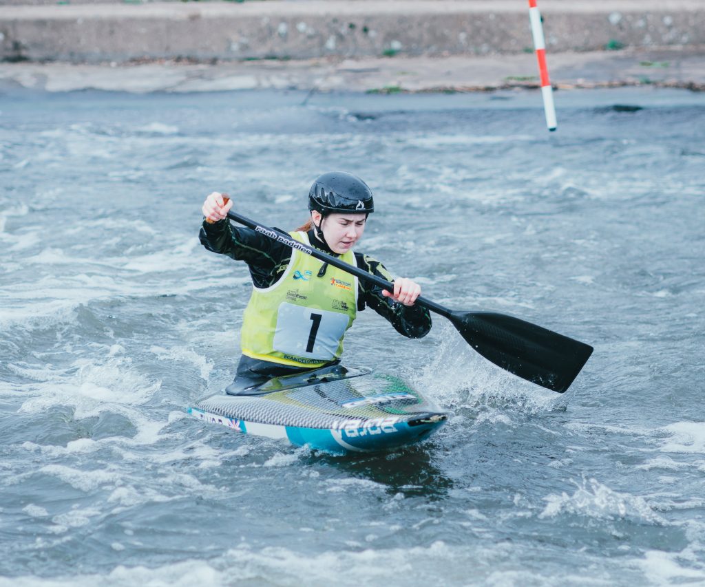Rachel in canoe slalom action