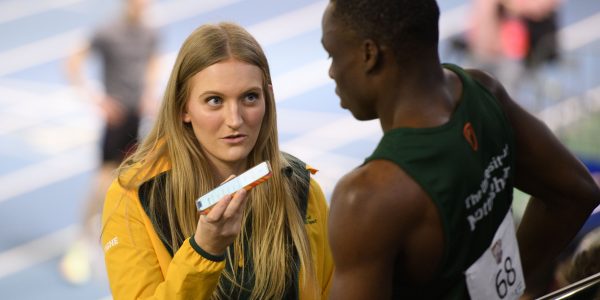 Mathilde Tighe interviewing an athlete