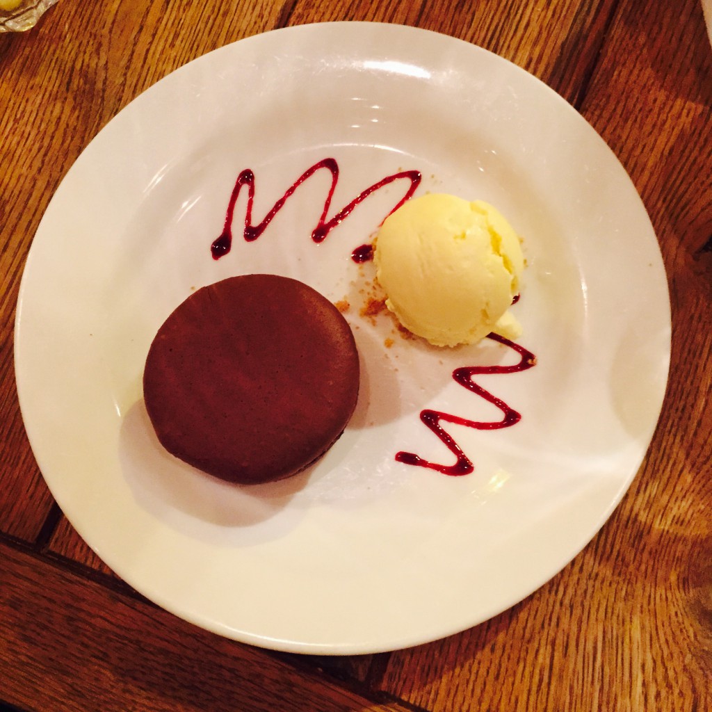 Chocolate macron and vanilla ice cream.