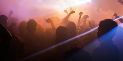 People dancing inside a nightclub during welcome week