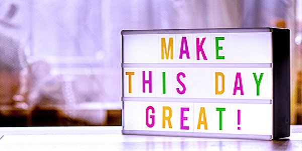 Poster with the motivational phrase "Make this Day Great"