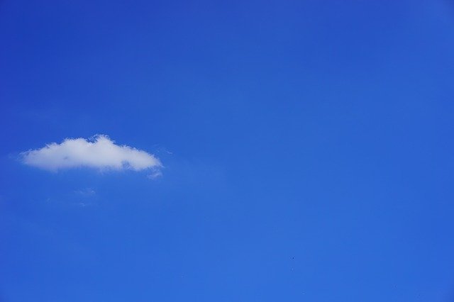 Clear blue sky, one light cloud