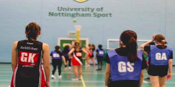 female students playing netball and university of nottingham sport centre
