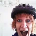 My lovely £8 black and purple bike helmet. Sure to keep my head in tact!