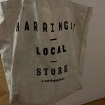 A tote bag featuring the words 'Harringay Local Store'