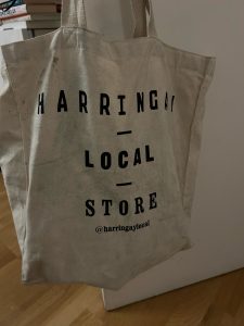 A tote bag featuring the words 'Harringay Local Store'
