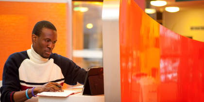 Male postgraduate student studying in the Pope Building, University Park