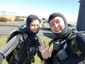 Some hobbies I picked up along the way – surfing, bouldering and scuba diving (not the most flattering of looks…).